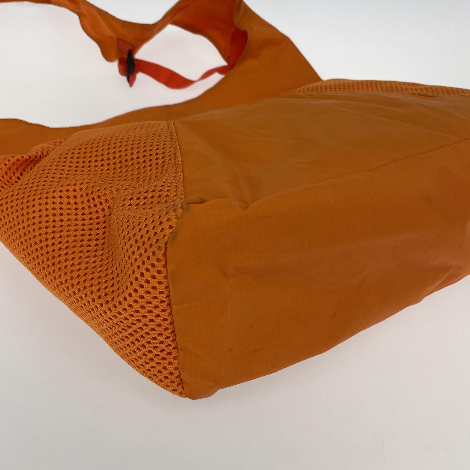 その他バッグ SPEAKEASY CROSSBODY SLING TOTE オレンジ