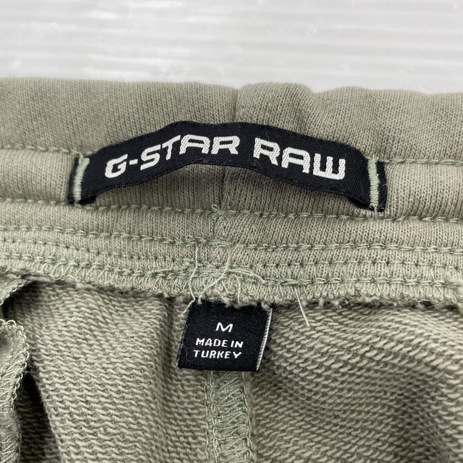 パンツ cargo pocket sweat pant M カーキ