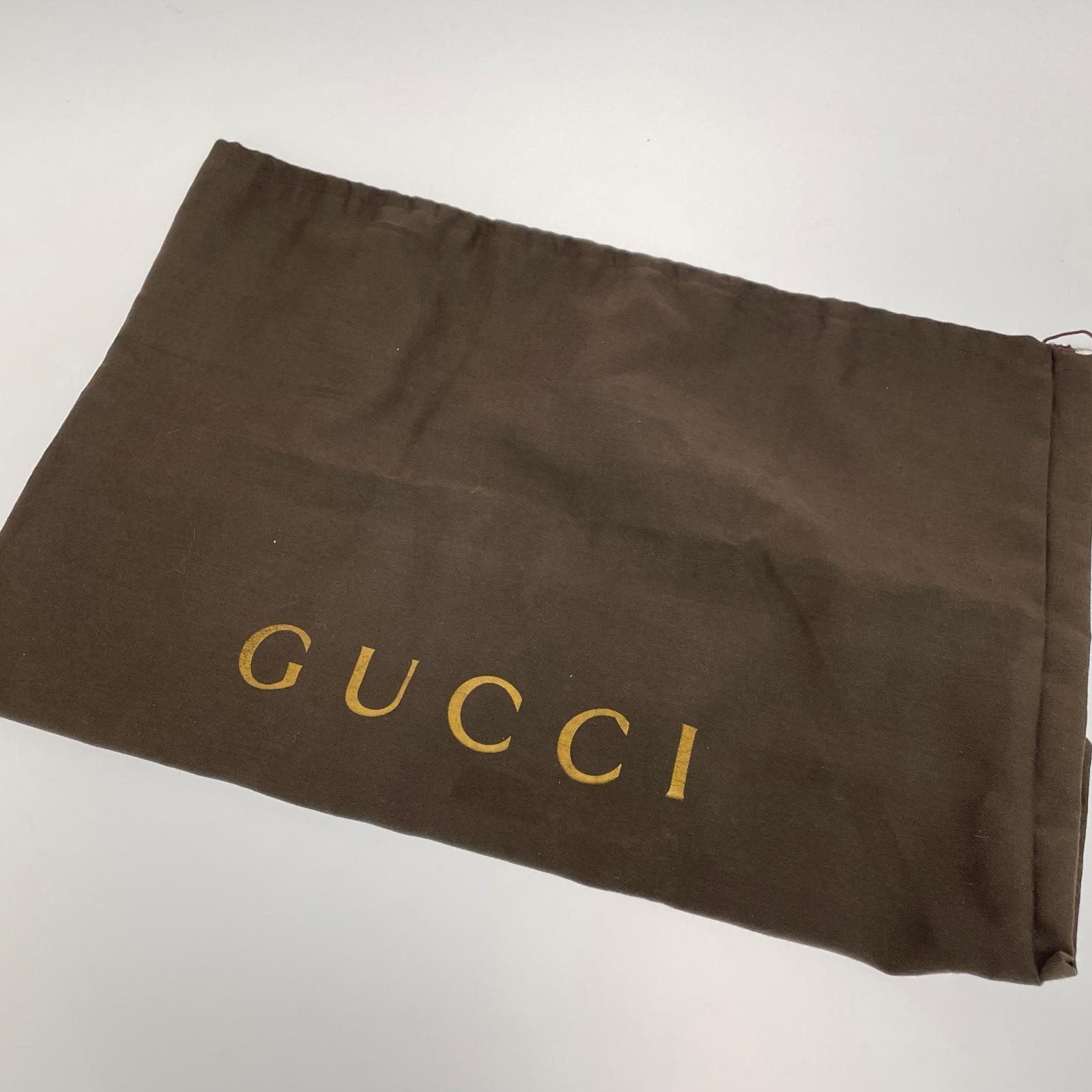 グッチ GGスプリーム キャットヘッド ドローストリング バックパック 473872