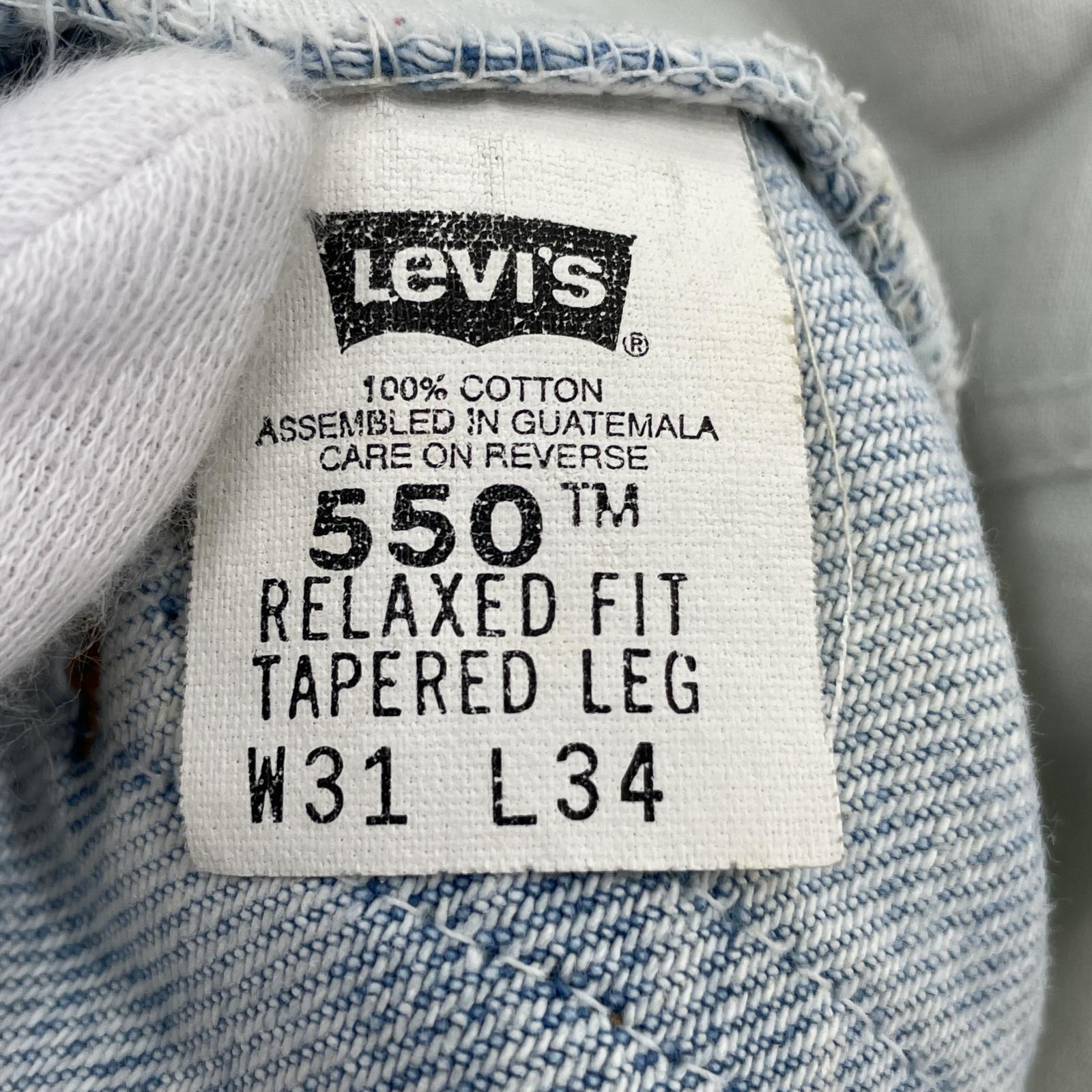 デニムパンツ 550 オレンジタブ 水色 (W31)