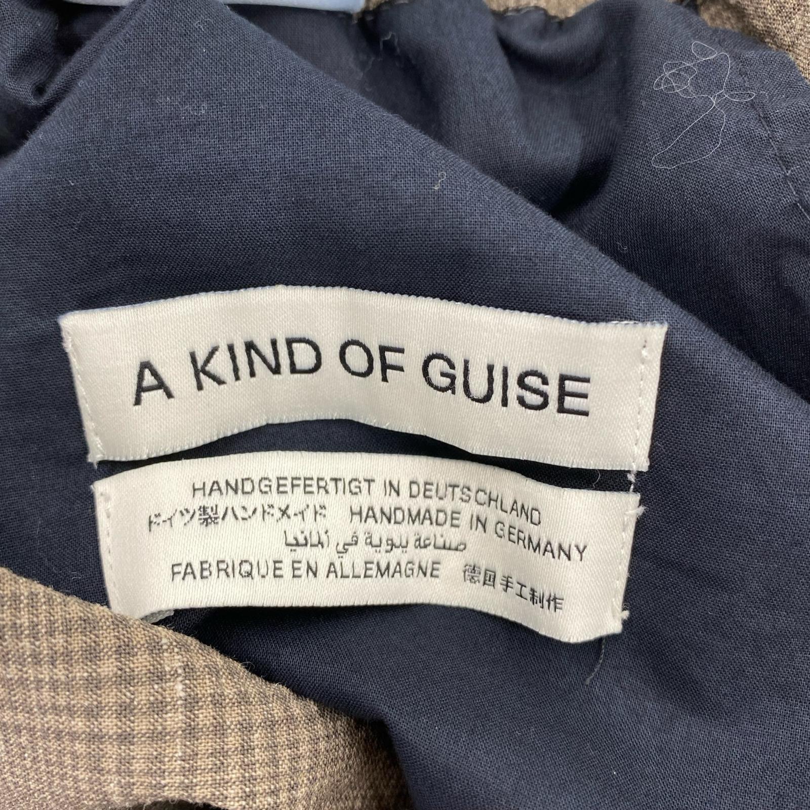 パンツ A KIND OF GUISE チェック 茶