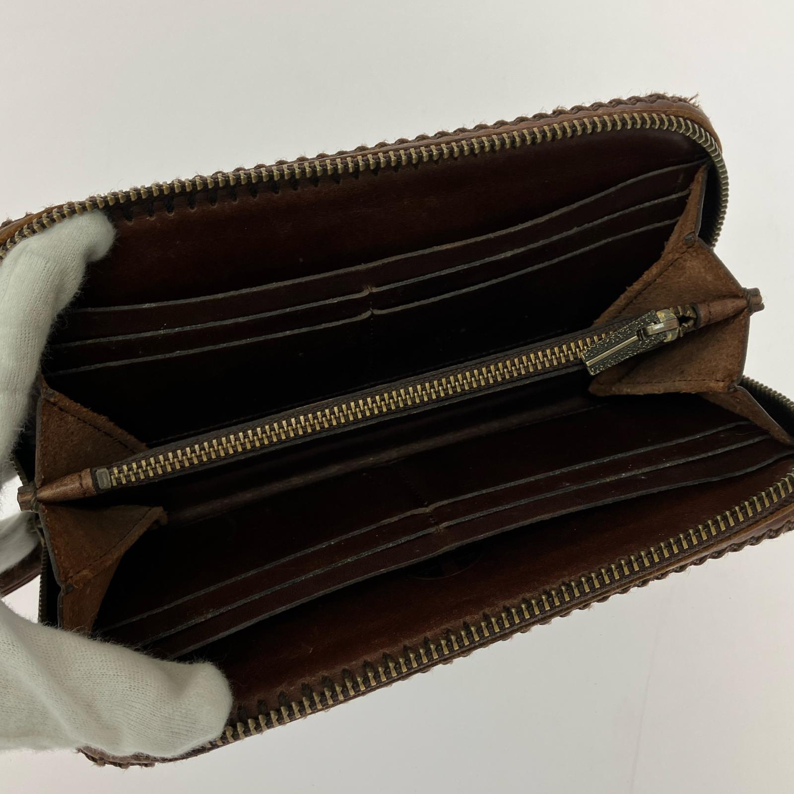 長財布 ラウンドZIP カービングウォレット ブラウン