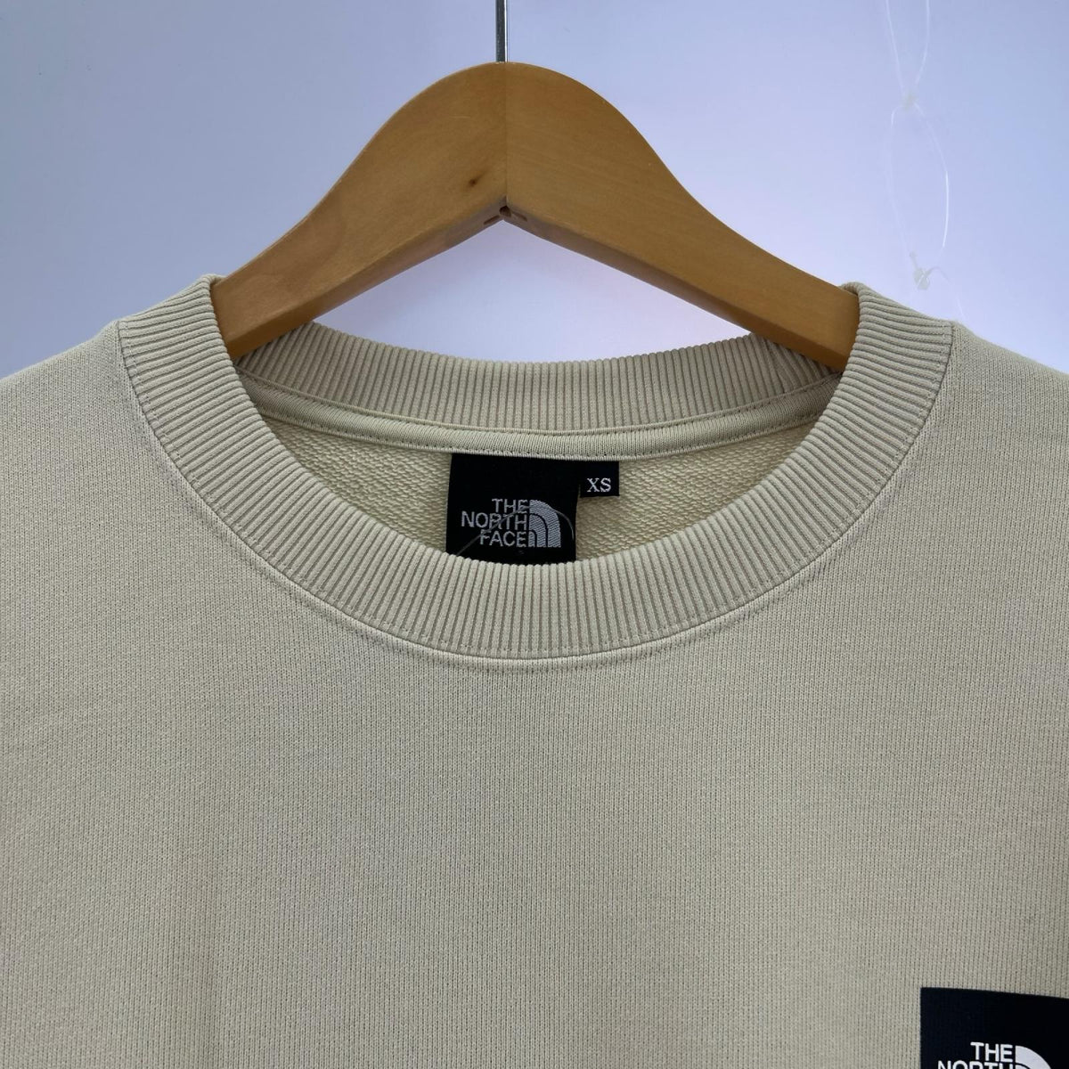 長袖Tシャツ THE NORTH FACE Heather Logo Crew NT12334 グラベル (XS) ベージュ