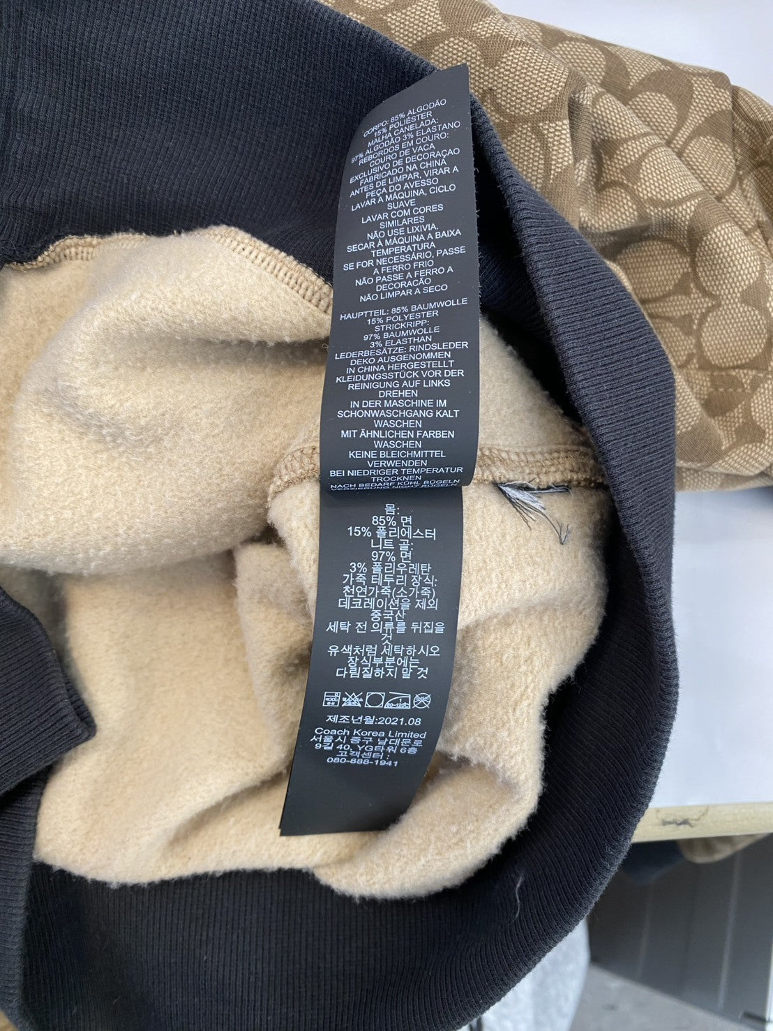 COACH シグネチャー ジップパーカー 11004424