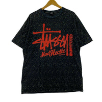 半袖Tシャツ ×UNDEFEATED×Mad Hectic 総柄 黒 (L) L ブラック