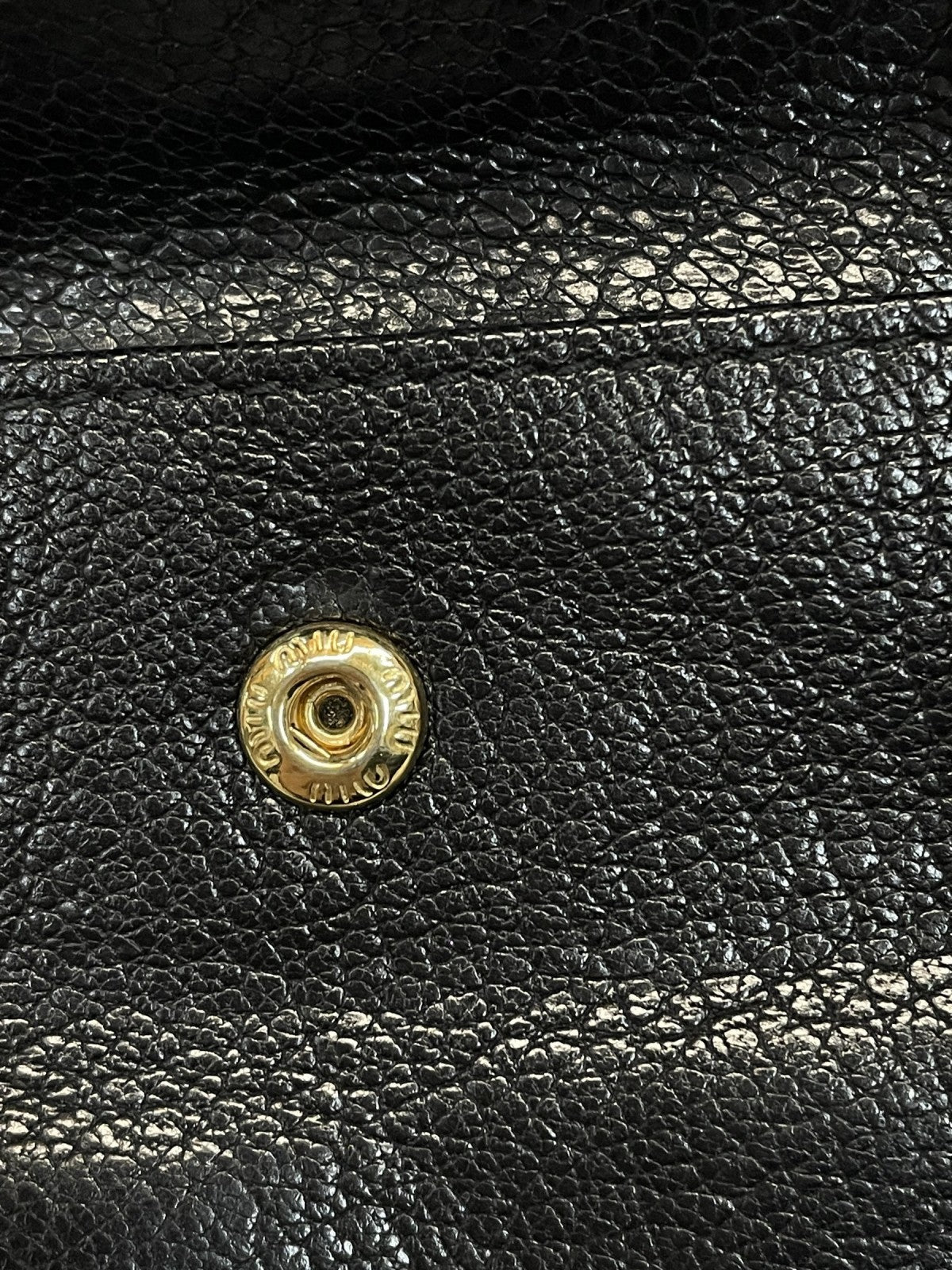 miumiu 二つ折り コンパクトウォレット 黒