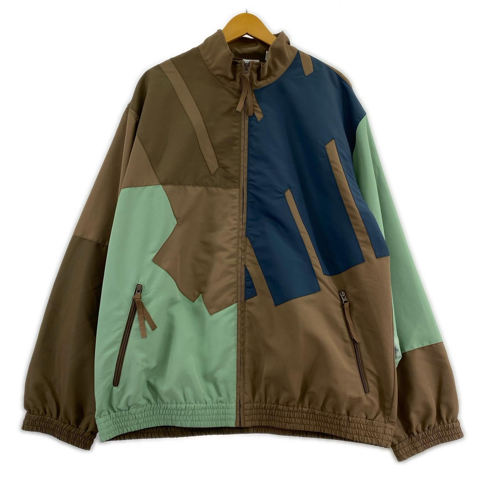 ジャケット UNDEFEATED Patchwork Icon Jacket (XL) ブラウン×マルチカラー LL