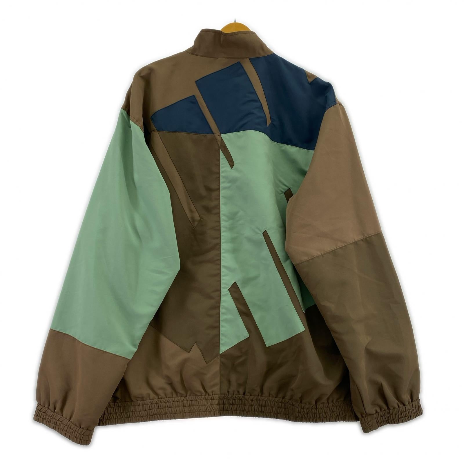 ジャケット UNDEFEATED Patchwork Icon Jacket (XL) ブラウン×マルチカラー LL