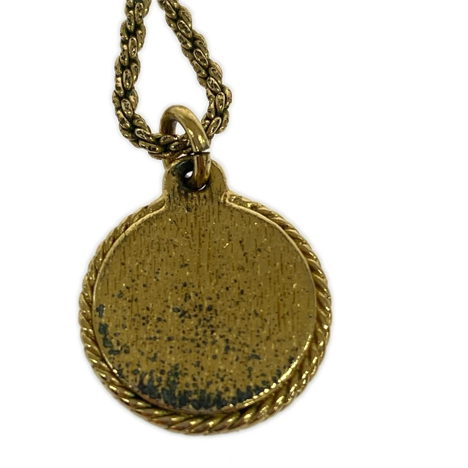 Dior コインモチーフ メダリオン型