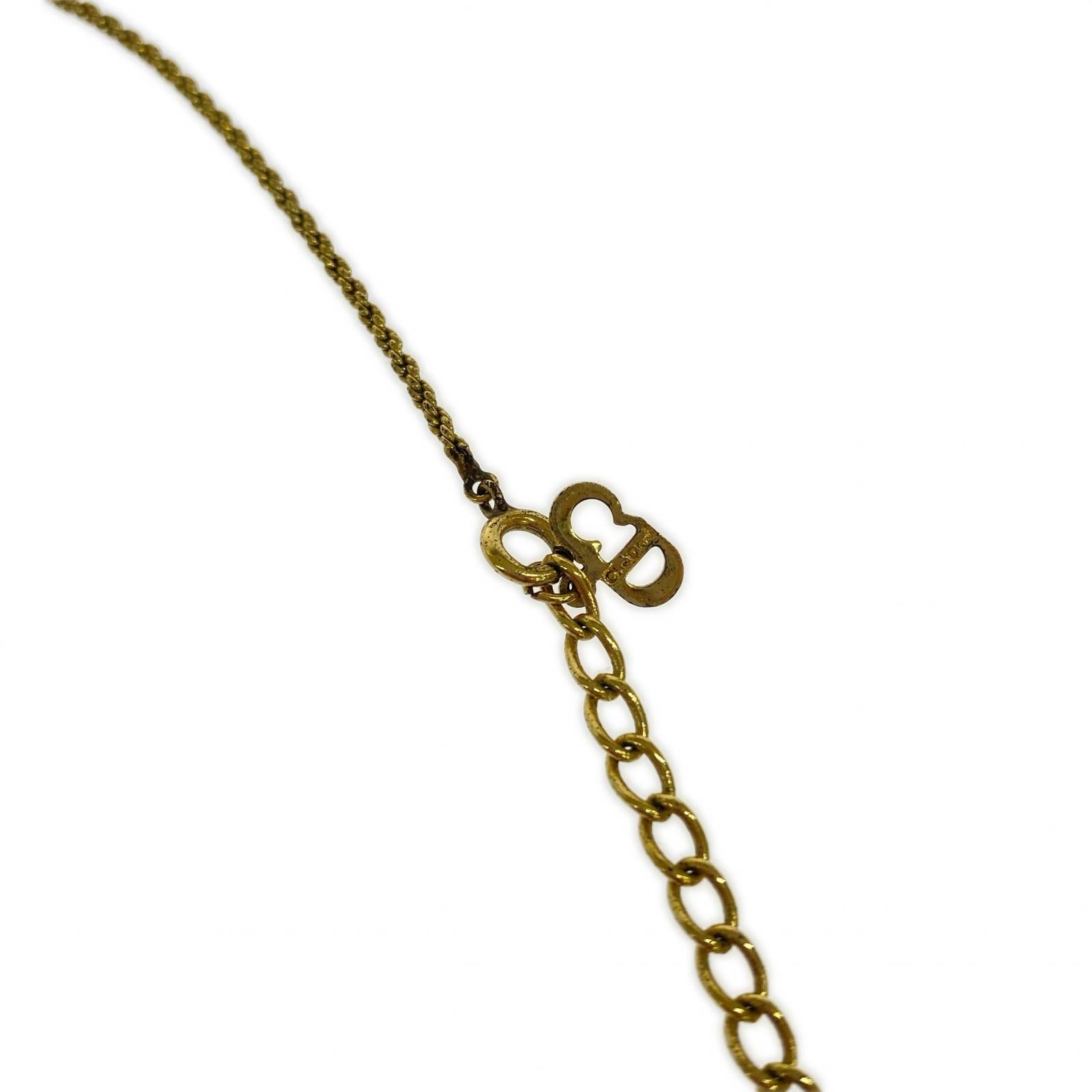 Dior コインモチーフ メダリオン型