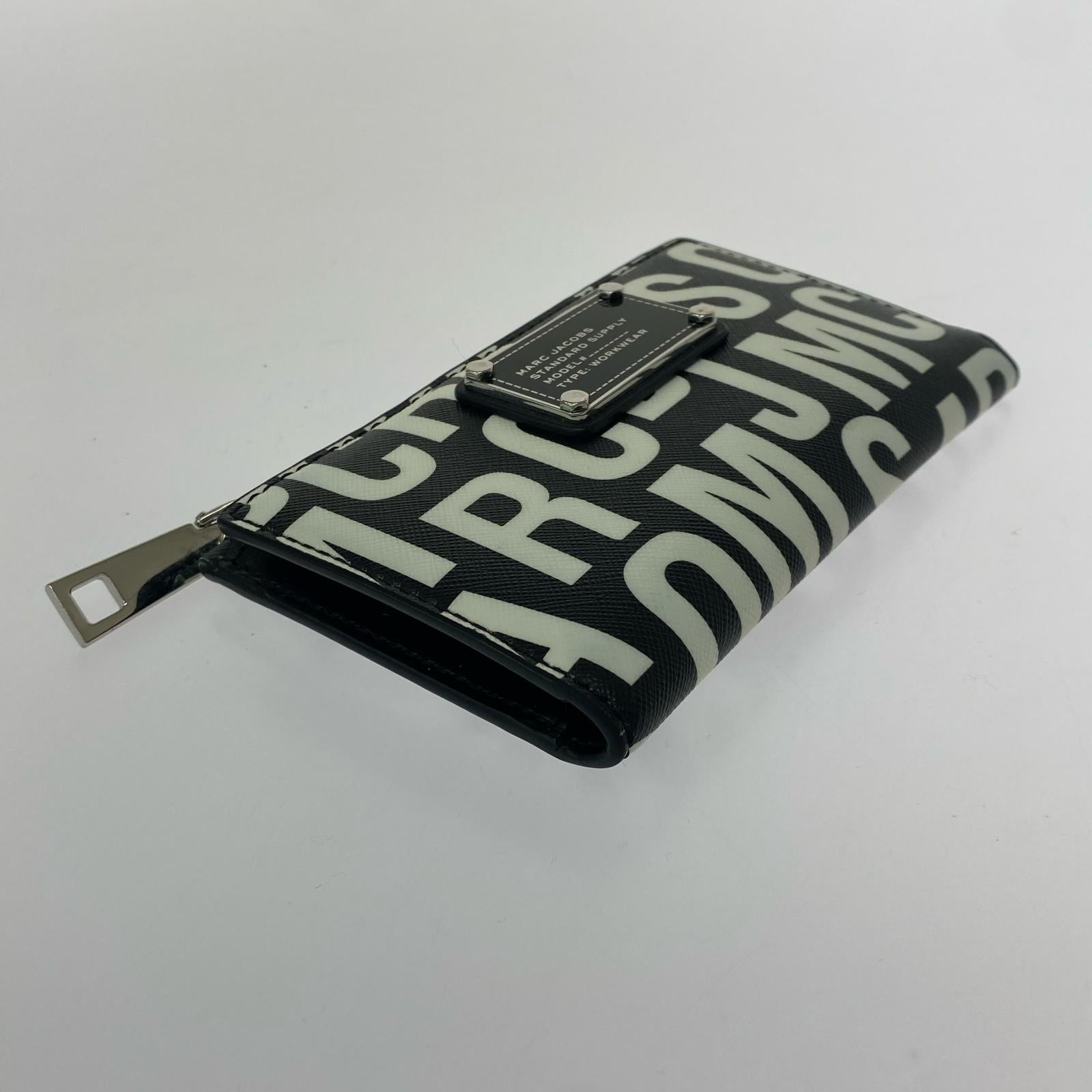 コンパクトウォレット シグネチャー 二つ折り財布