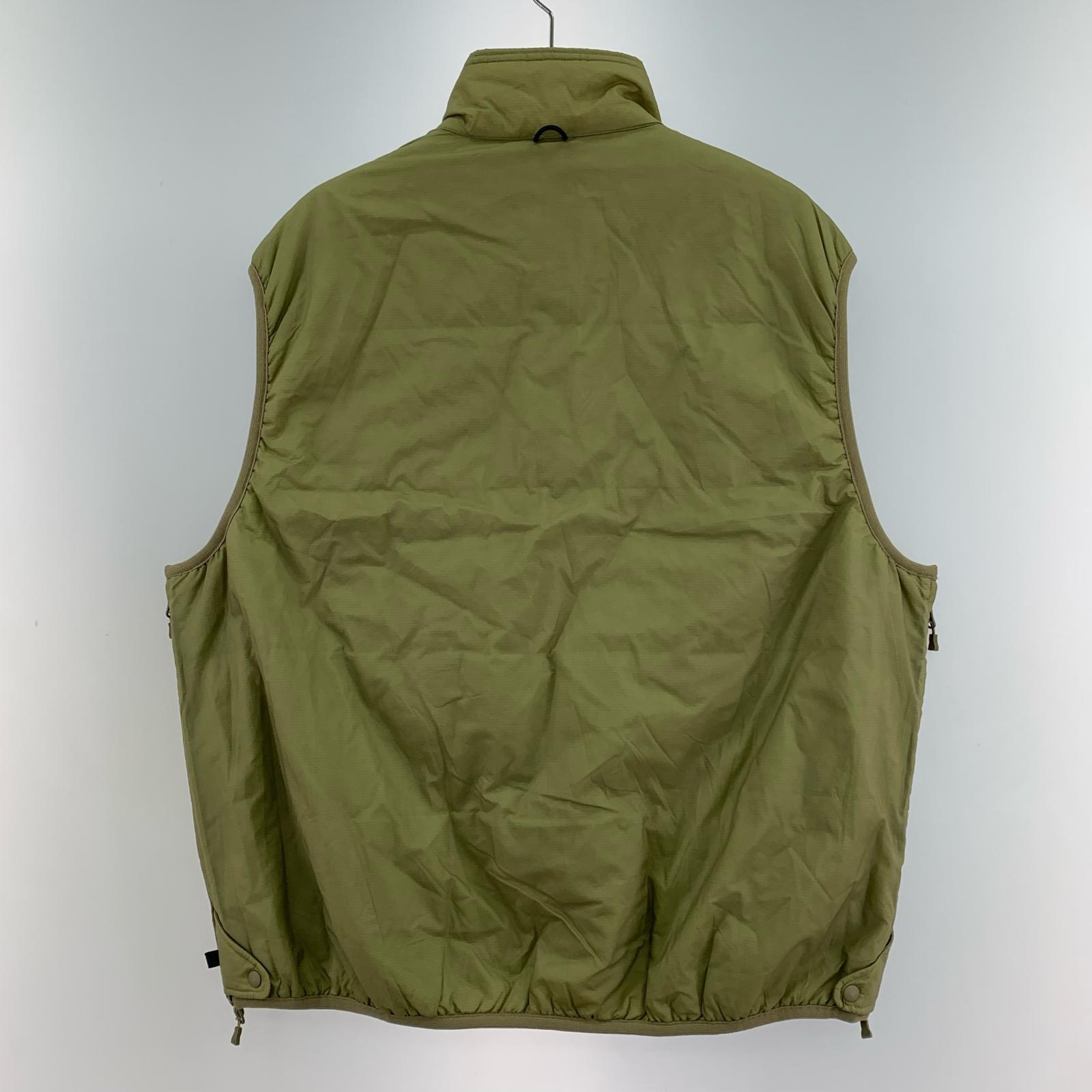 長袖シャツ tech reversible pullover puff vest オリーブ