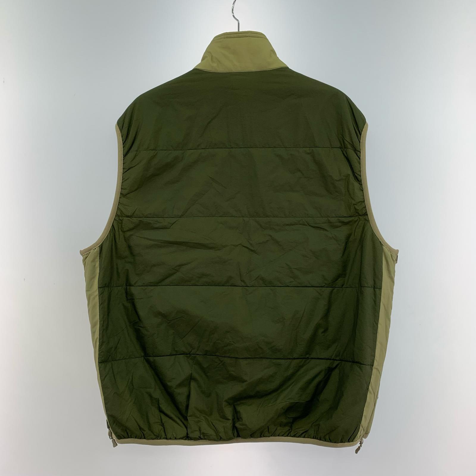長袖シャツ tech reversible pullover puff vest オリーブ