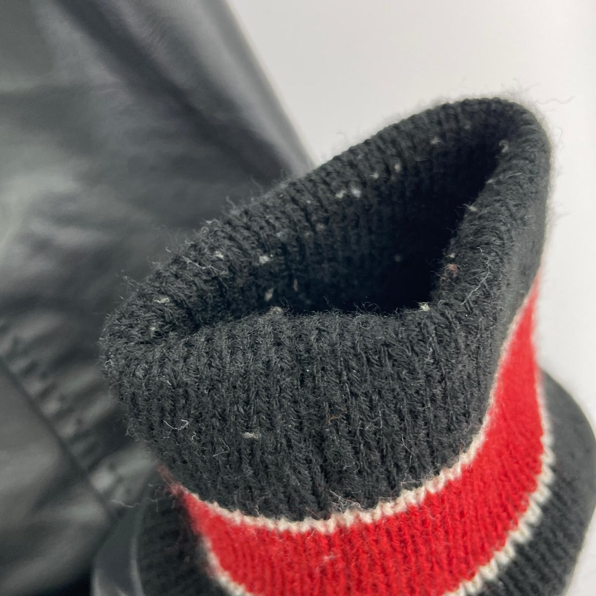 ブルゾン NEFF レザースリーブ スタジャン L ブラック