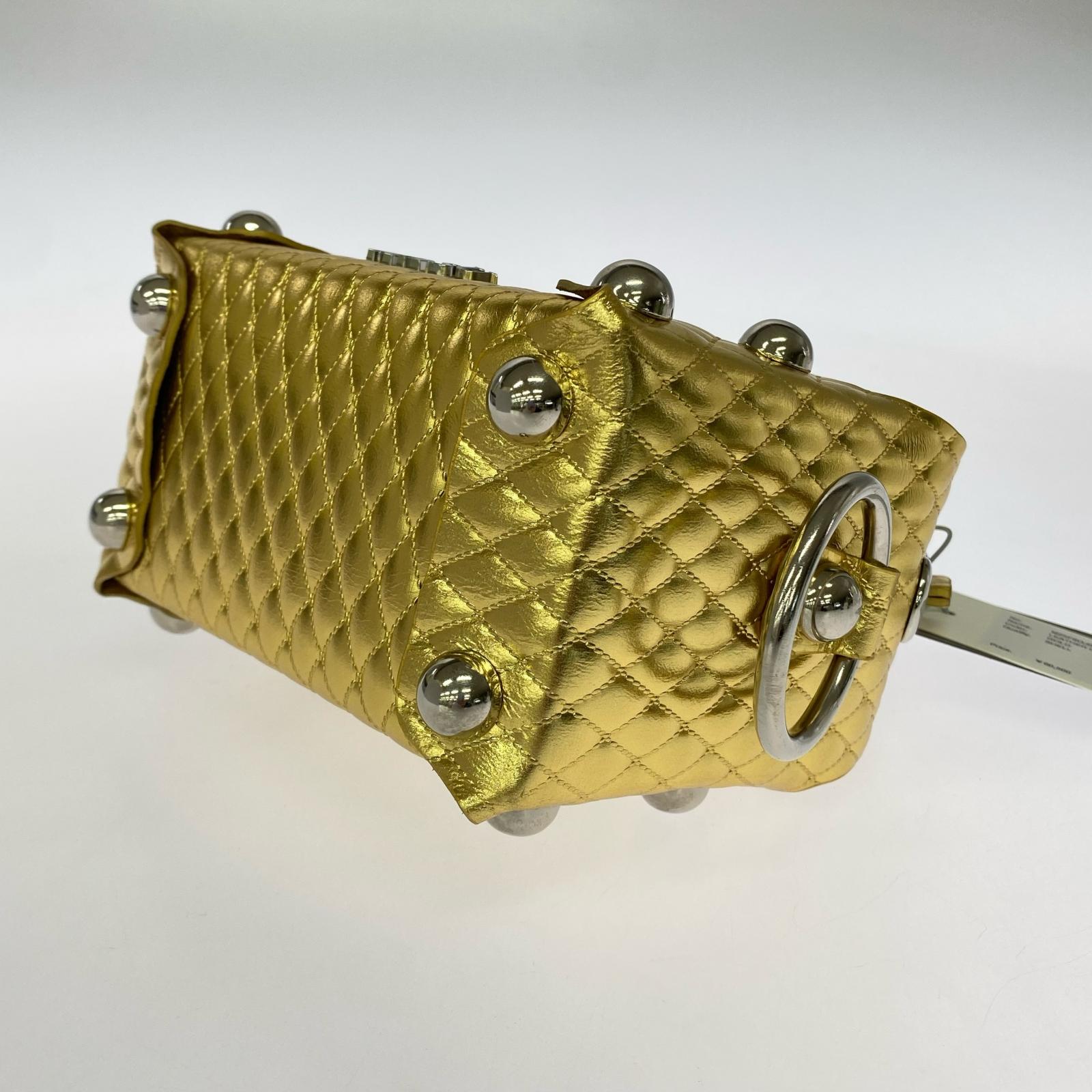 その他バッグ LEATHER CAKE BAG GOLD ゴールド