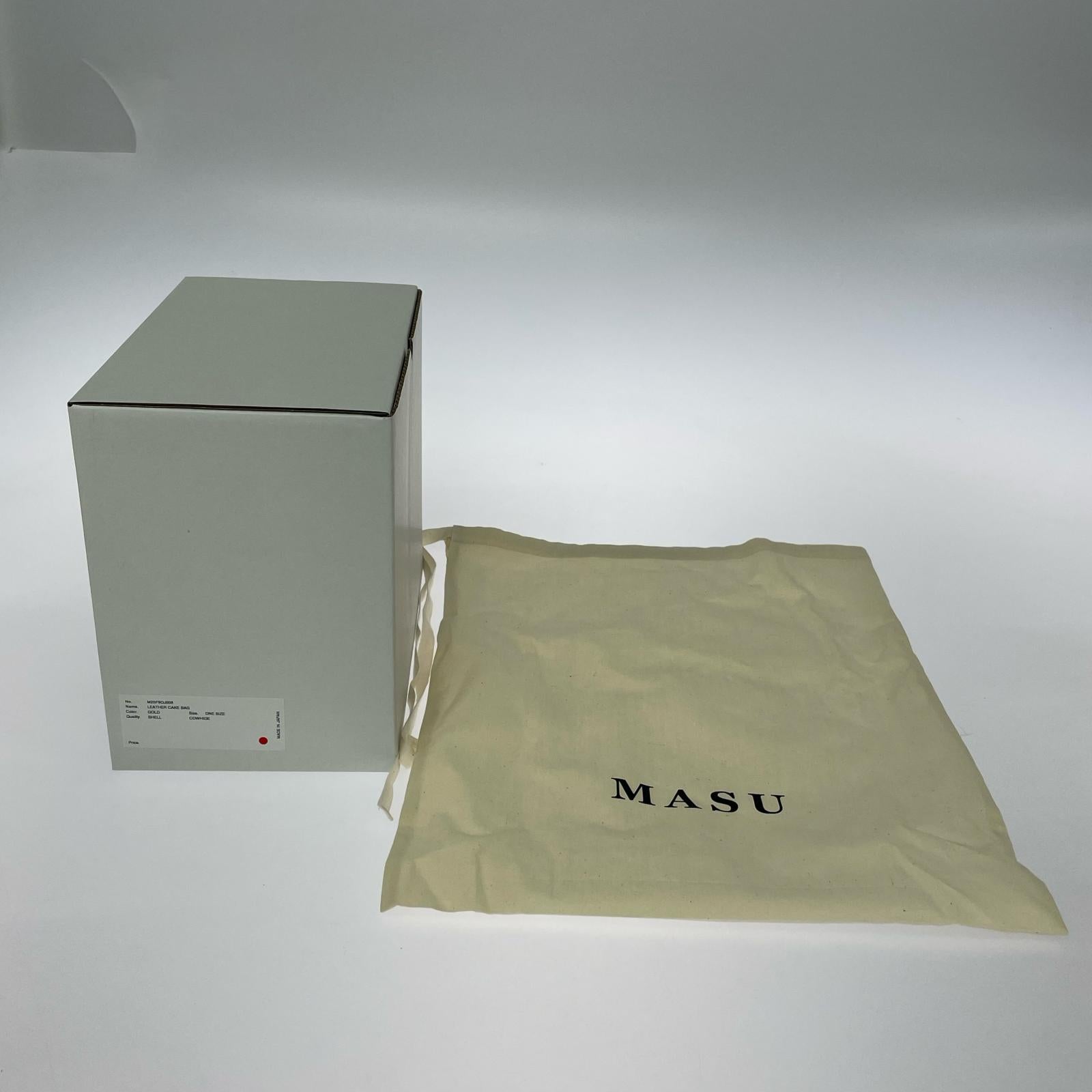 その他バッグ LEATHER CAKE BAG GOLD ゴールド