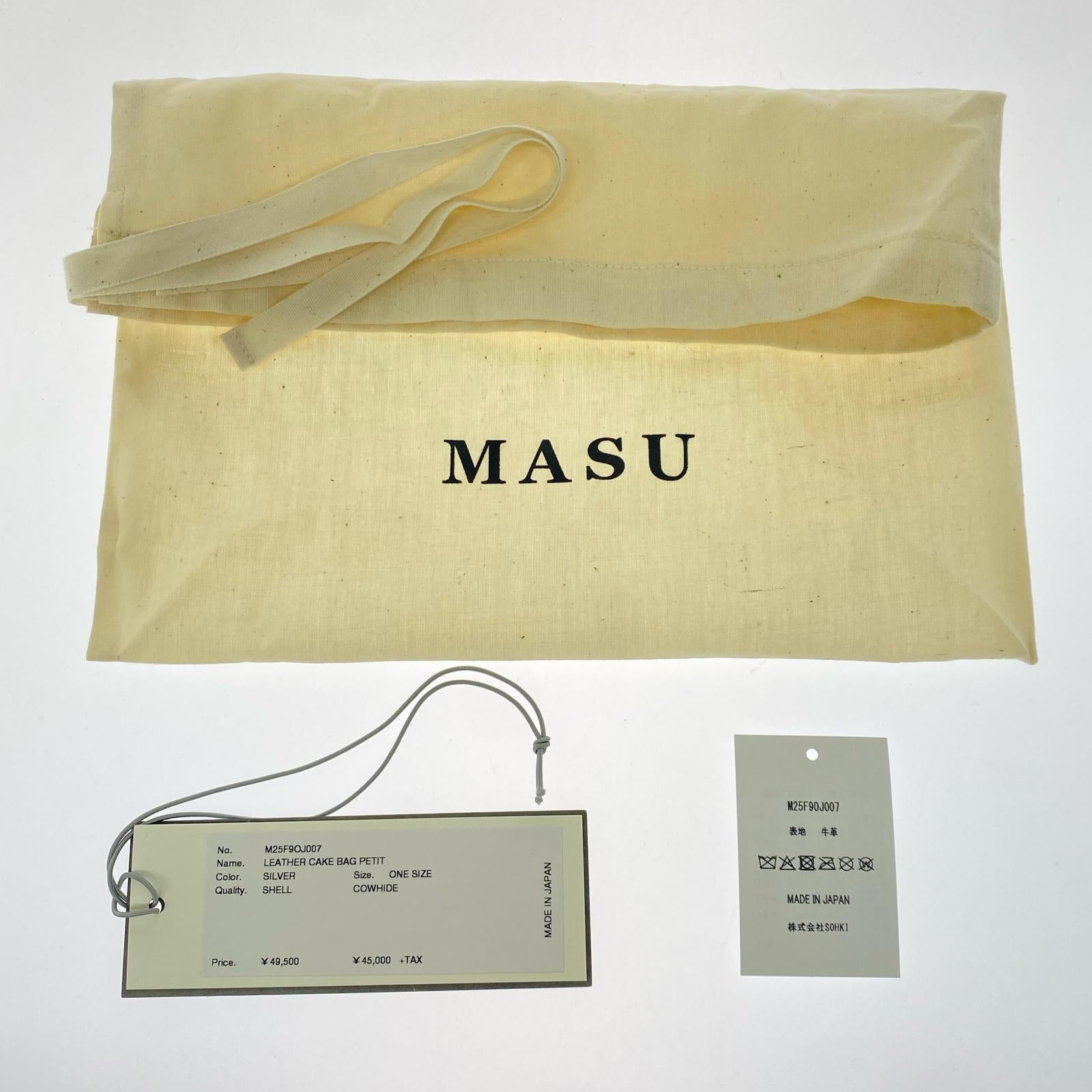 その他バッグ LEATHER CAKE BAG PETIT SILVER シルバー