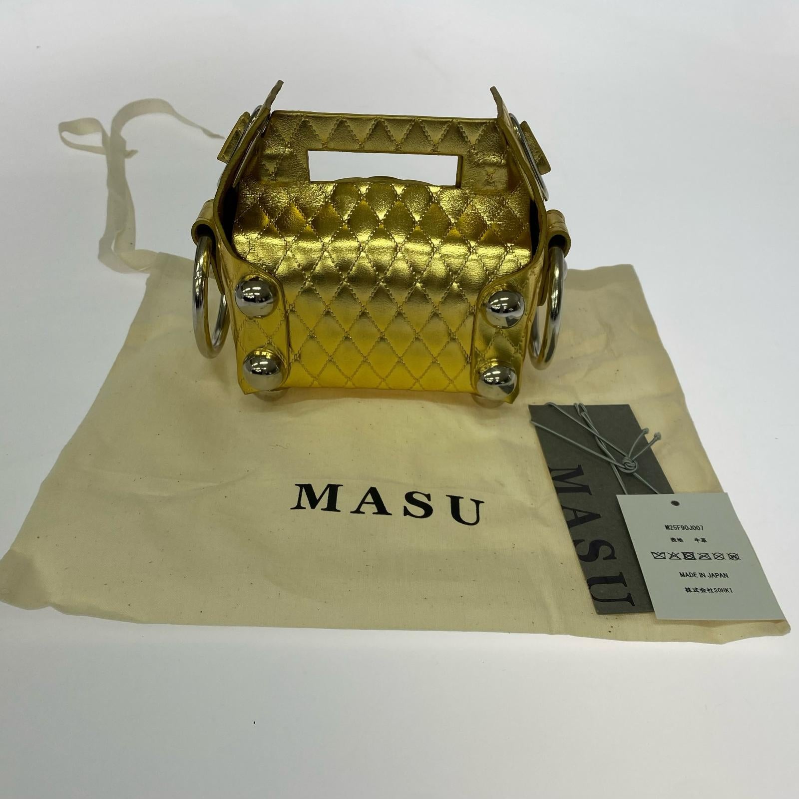 その他バッグ LEATHER CAKE BAG PETTI GOLD