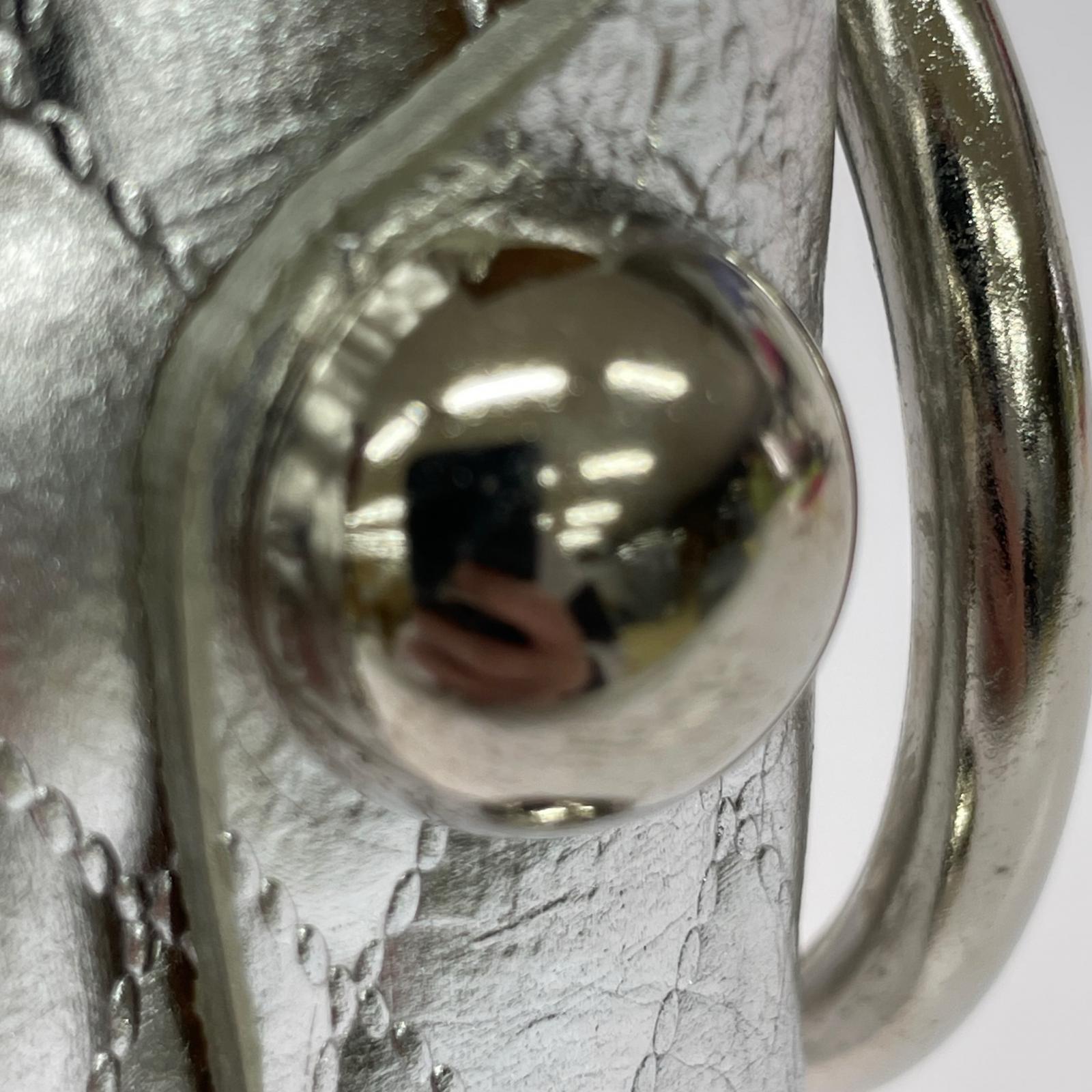 その他バッグ LEATHER CAKE BAG PETIT SILVER シルバー