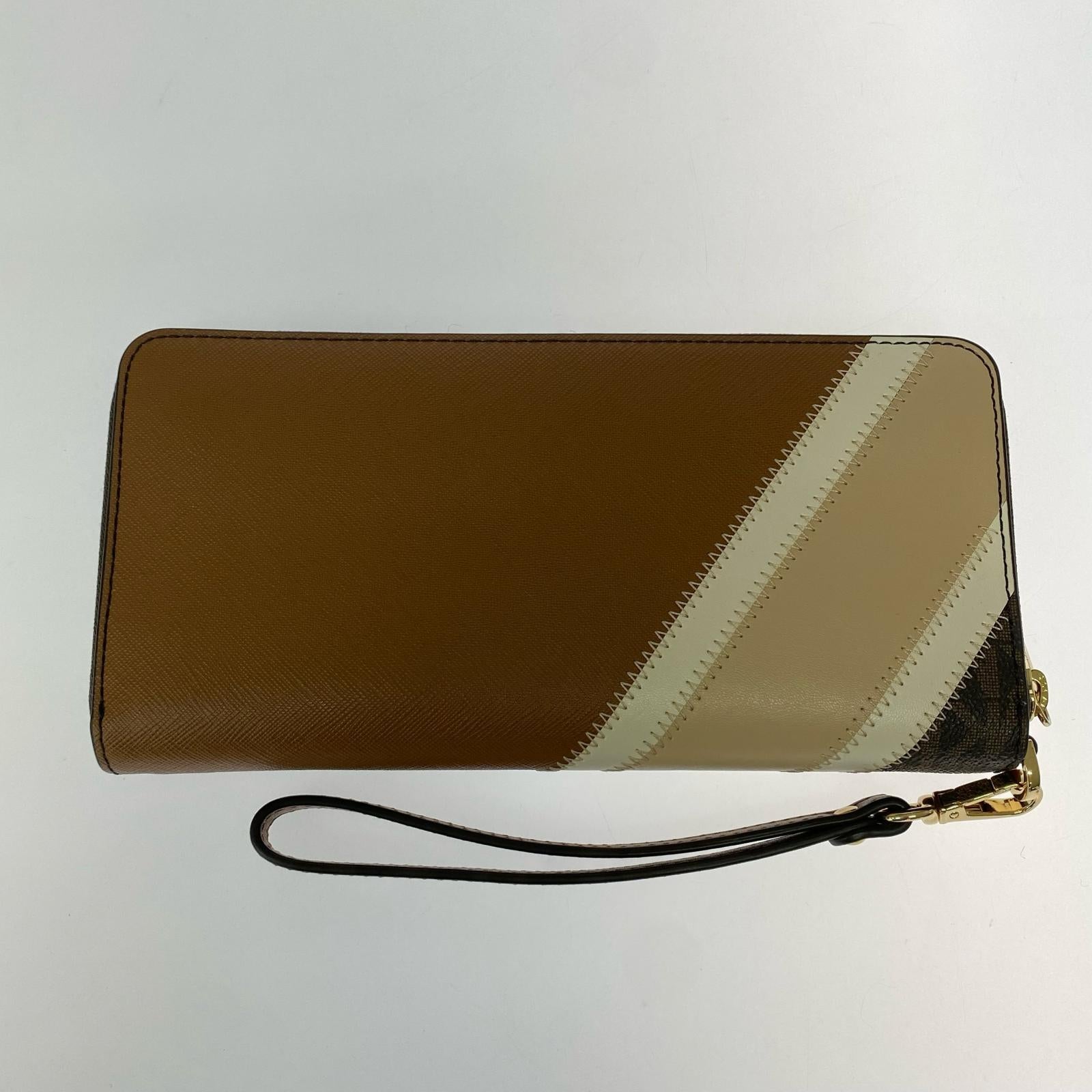 長財布 MICHAEL KORS JET SET TRAVEL MKシグネチャーラウンドジップウォレット ブラウン系 ブラウン