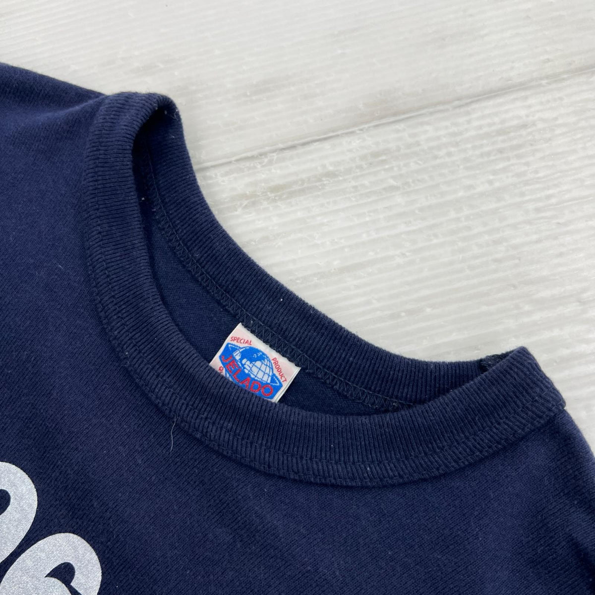 長袖Tシャツ レーシングフラッグL/STee 紺 38 ネイビー