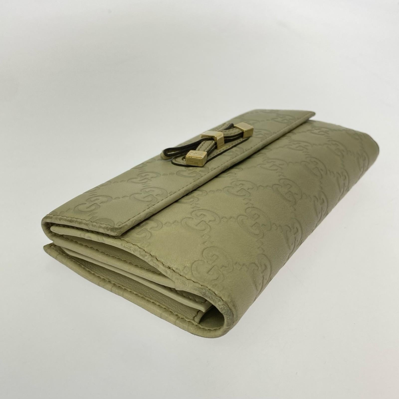 GUCCI シマ リボン 167464・496334