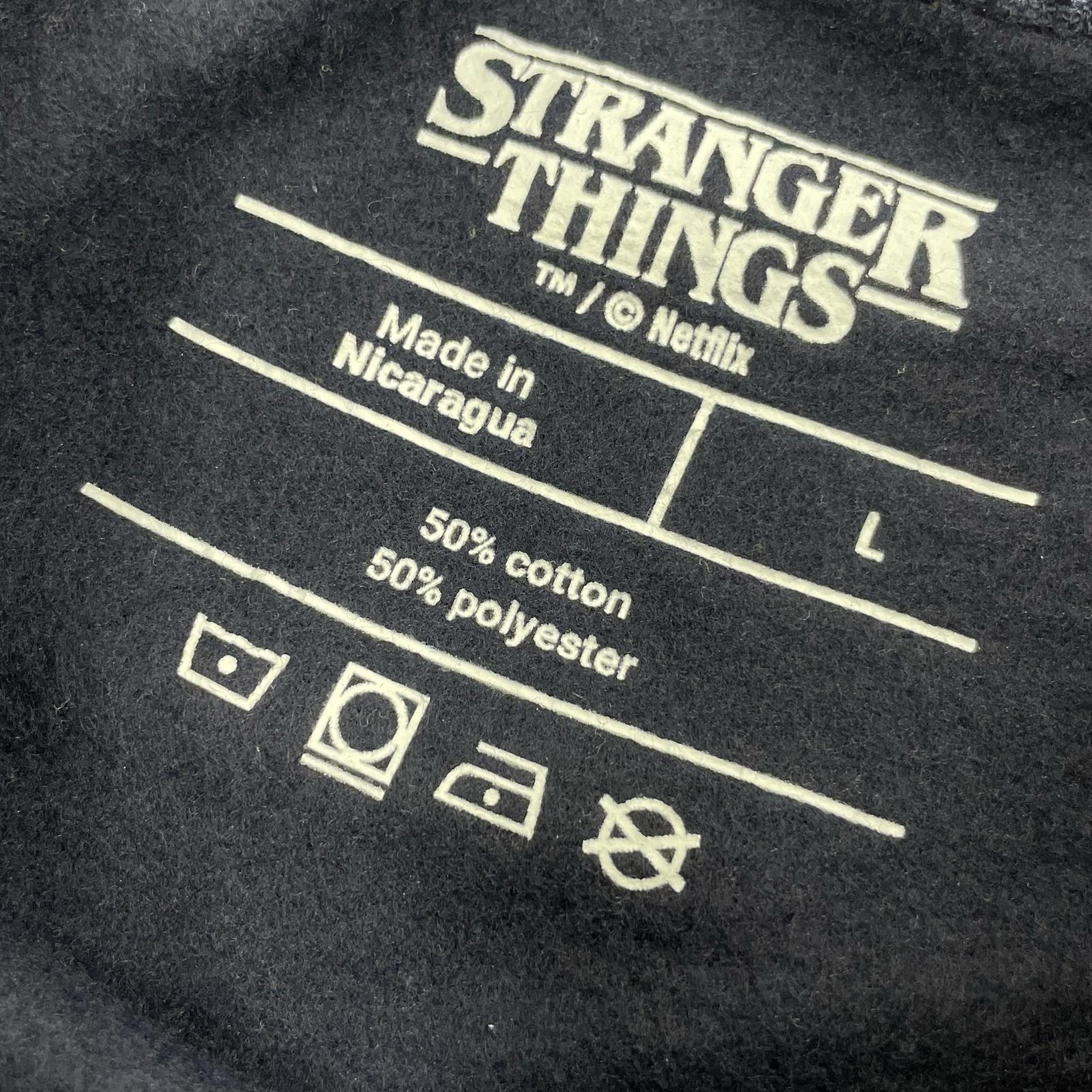 スウェット STRANGER THINGS BEAM ME UP L ネイビー