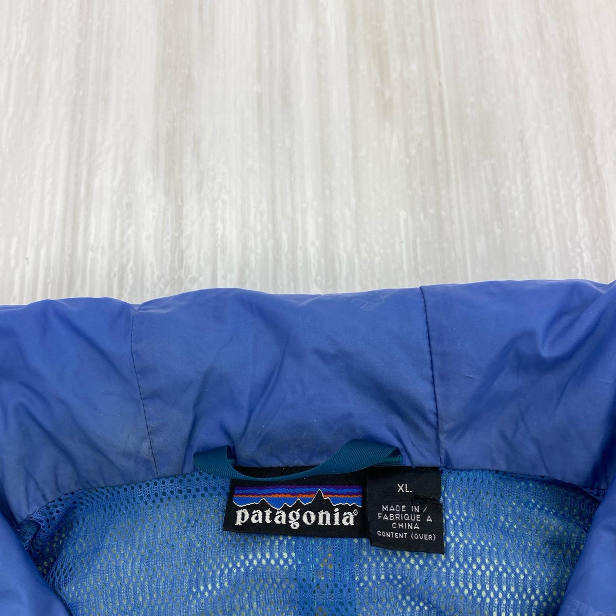 マウンテンパーカー patagonia ストームジャケット 85030 青 (XL) ブルー