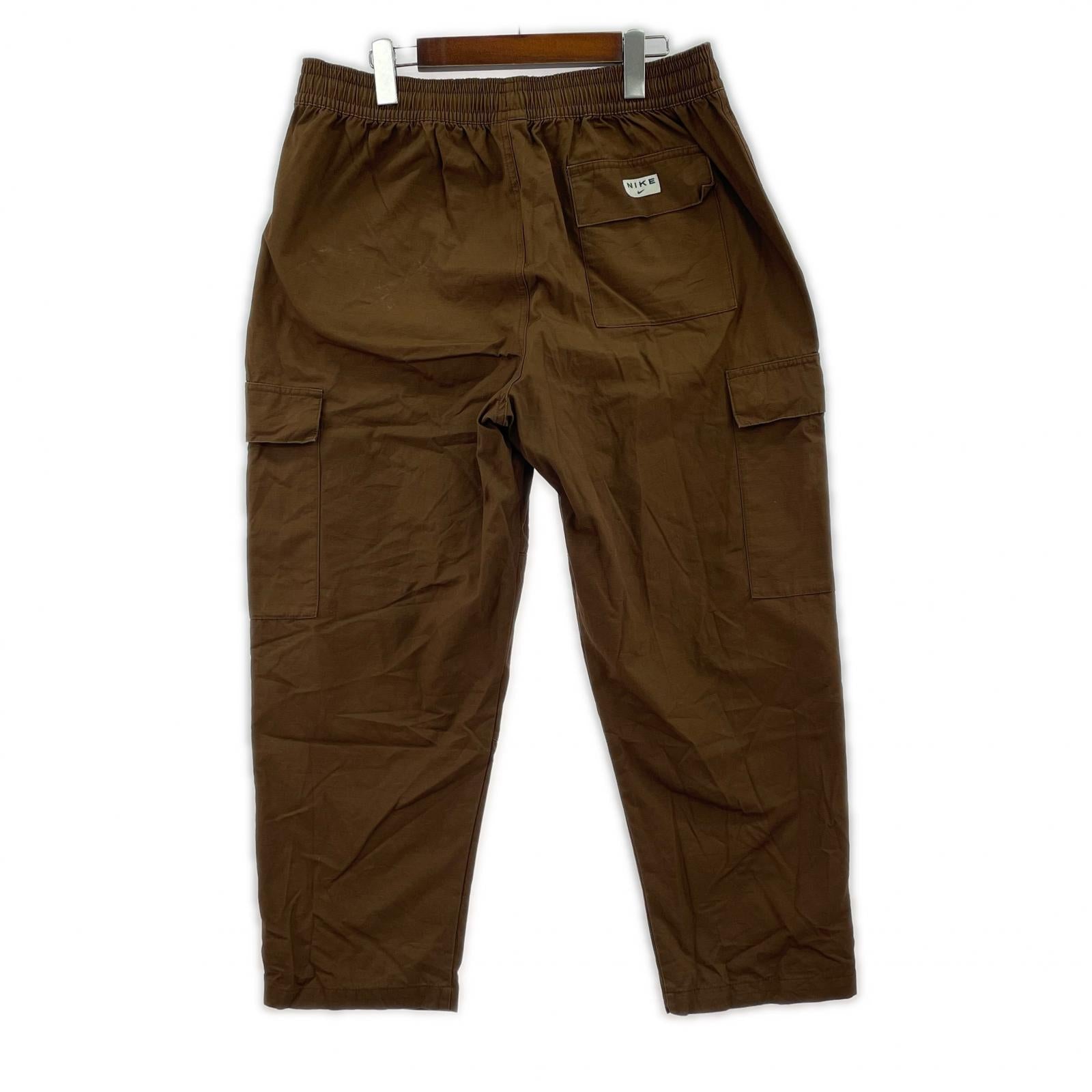 パンツ AS M NK CARGO WVN PANT ブラウン