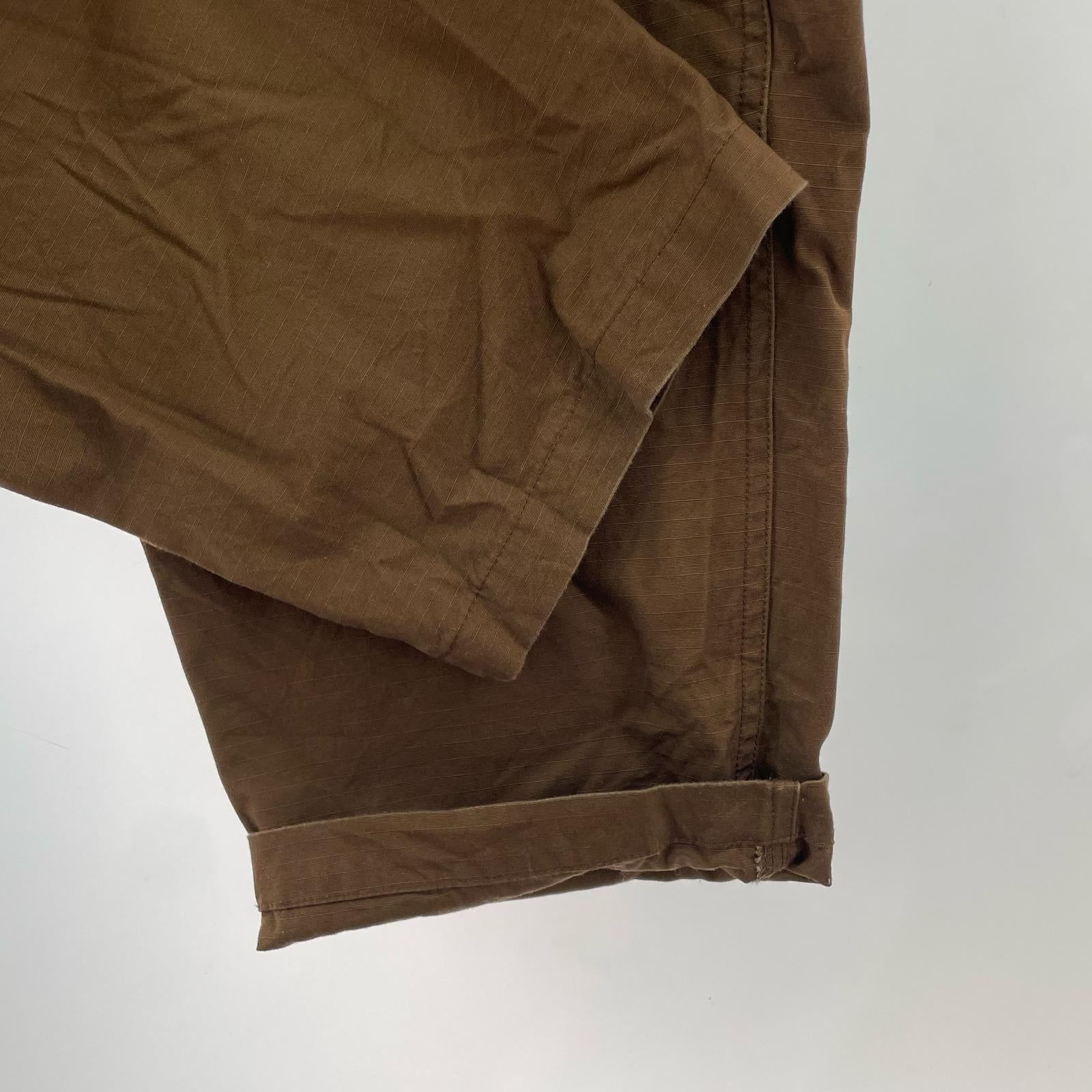パンツ AS M NK CARGO WVN PANT ブラウン