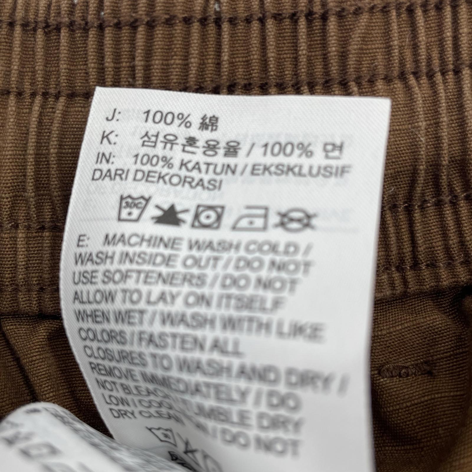 パンツ AS M NK CARGO WVN PANT ブラウン
