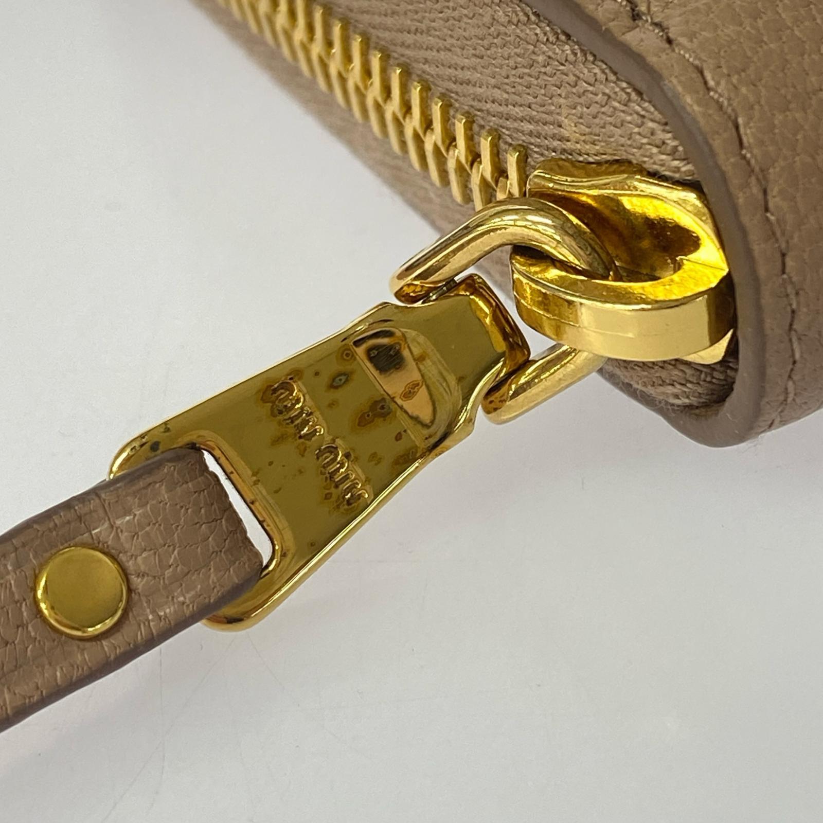 MiuMiu ラウンドジップ 財布