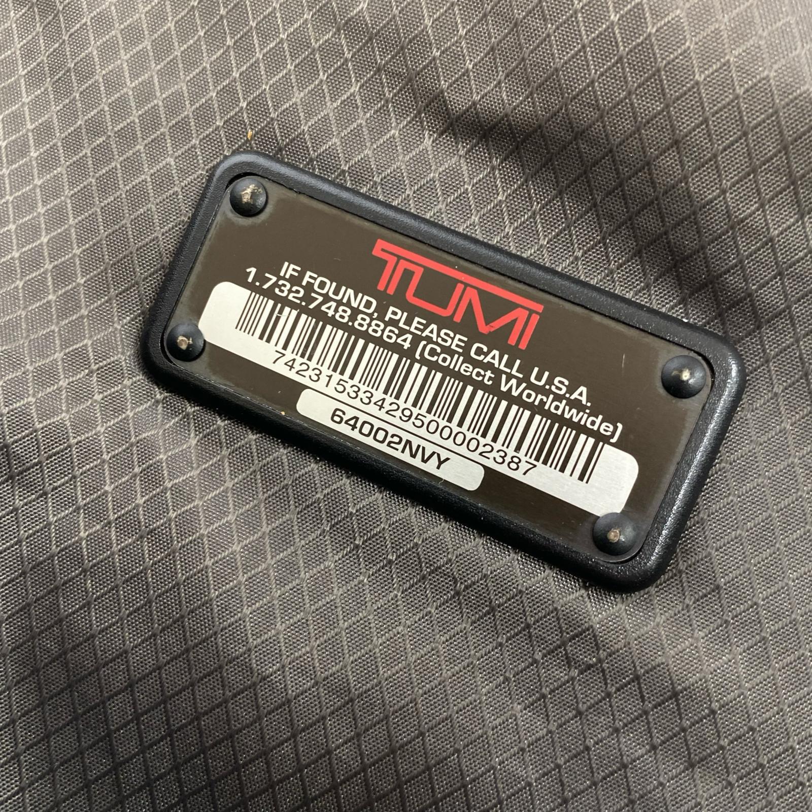 リュック・デイパック TUMI レザー×ナイロン バックパック 黒 ブラック