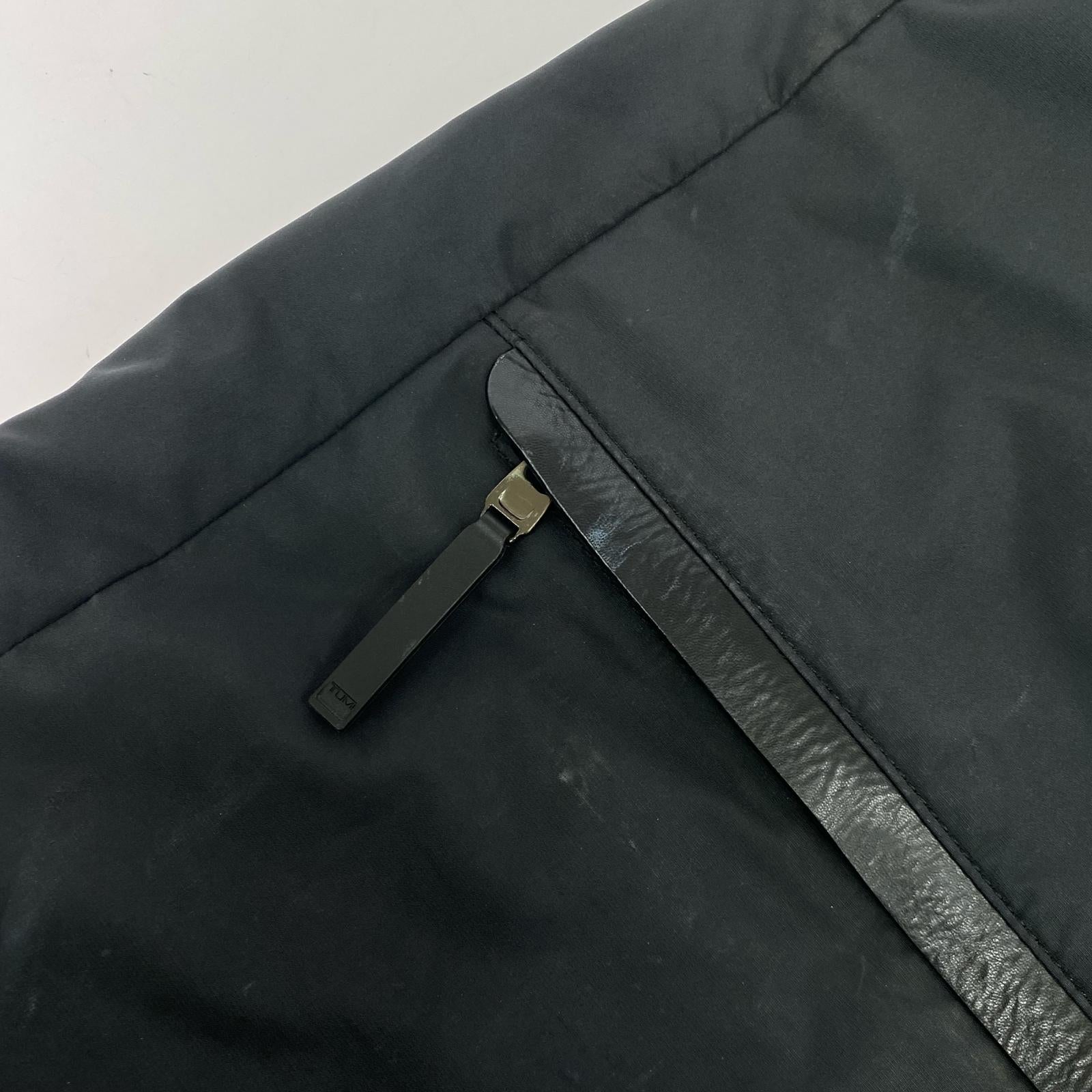 リュック・デイパック TUMI レザー×ナイロン バックパック 黒 ブラック