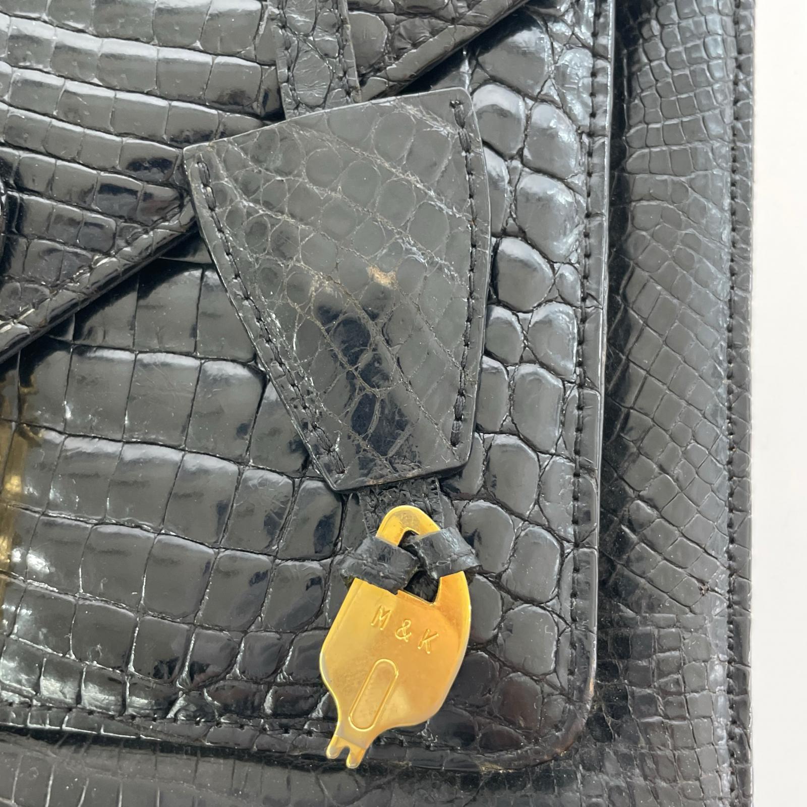 その他バッグ クロコ ハンドバッグ ブラック