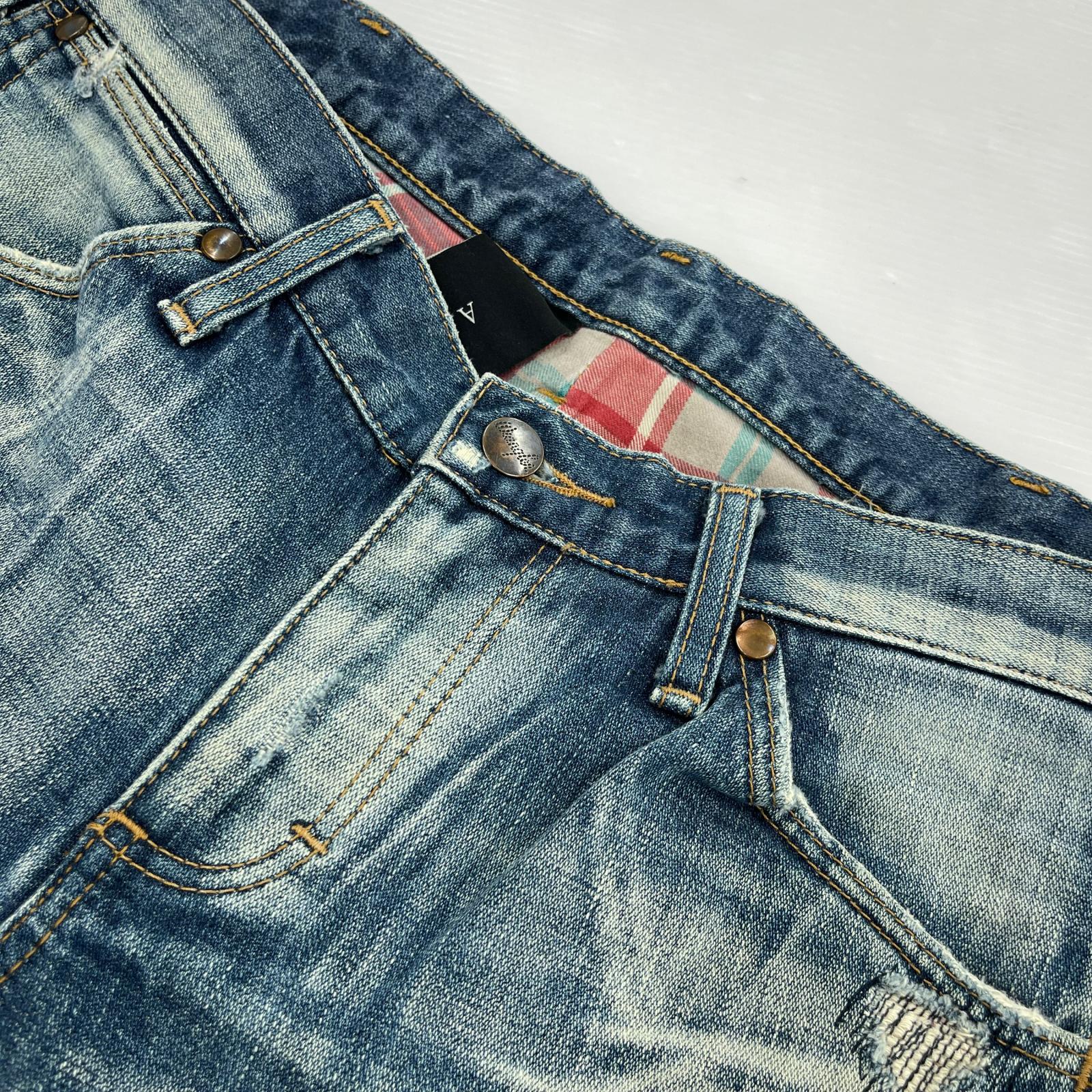 デニムパンツ × Wrangler フレア リペア S