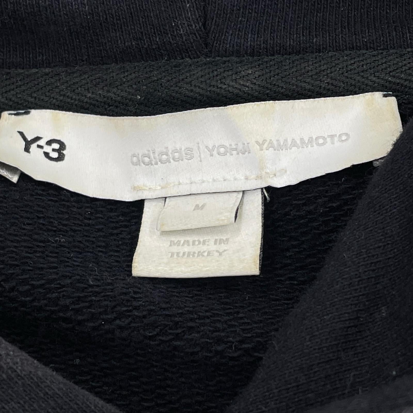 パーカー GV6056 U SQ LBL GRPHC HOODIE (M) M ブラック