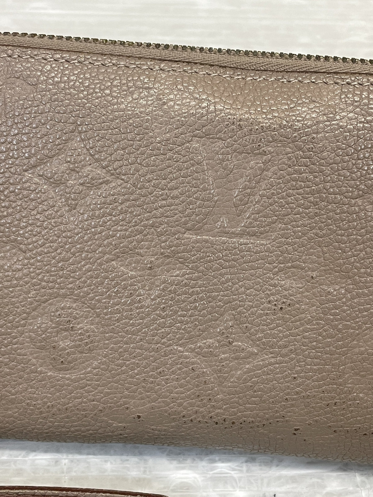LOUIS VUITTON モノグラム アンプラント ジッピーウォレット M69034