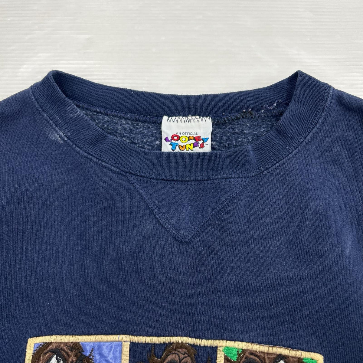スウェット Loone Tunes 刺繍トレーナー ネイビー