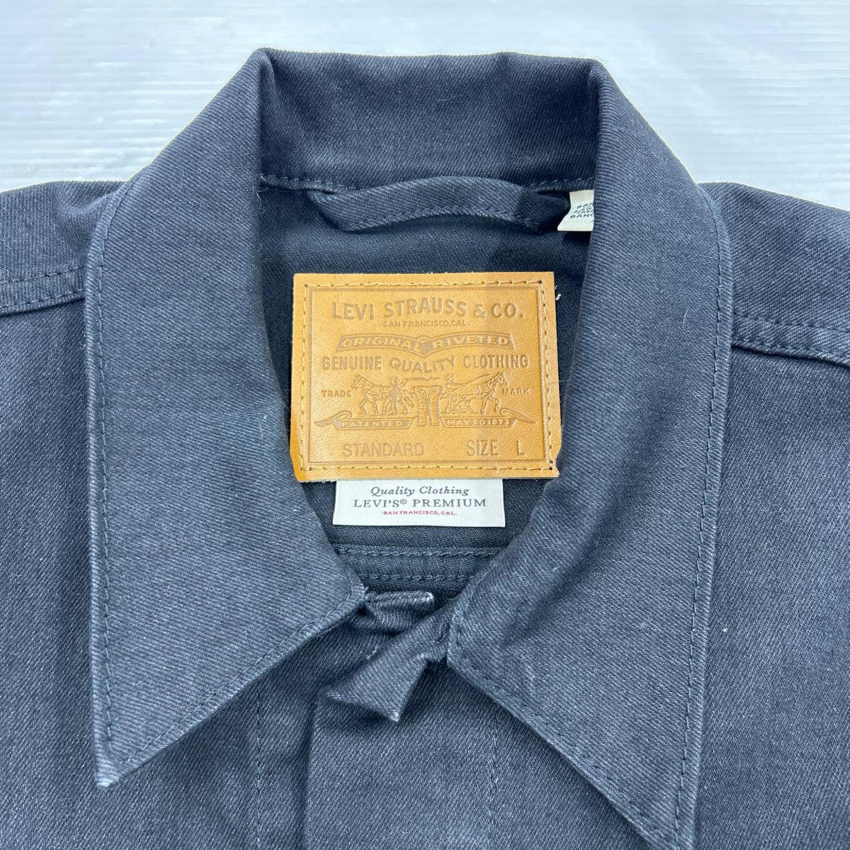 ジャケット premium trucker jacket 黒(L) L ブラック