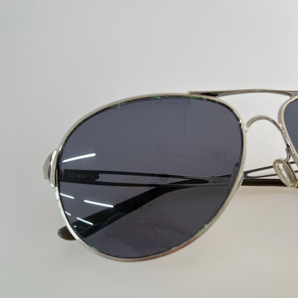 その他アクセサリー OAKLEY カヴィート CAVEAT OO4054-02 シルバー
