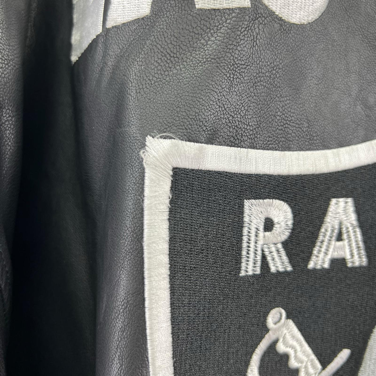ジャケット NFL RAIDERS フェイクレザーブルゾン ブラック 46 ブラック