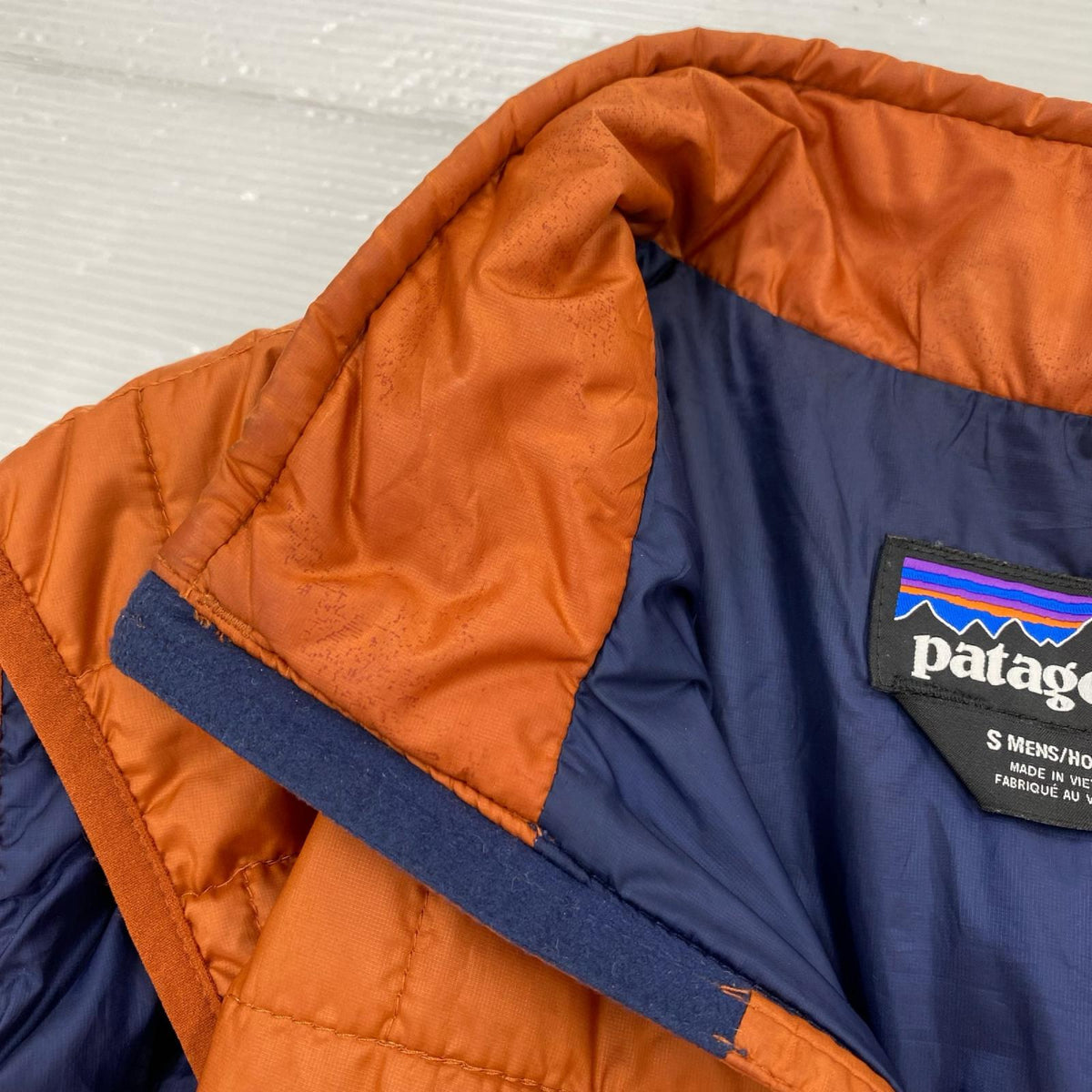 長袖シャツ Nano Puff Vest S オレンジ