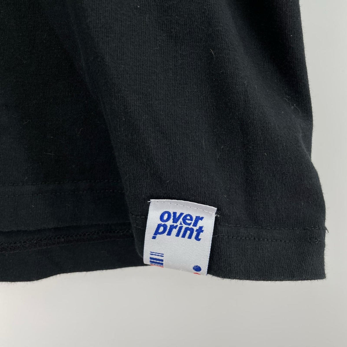 半袖Tシャツ OVERPRINT 背面チャッキープリント BLK XL ブラック