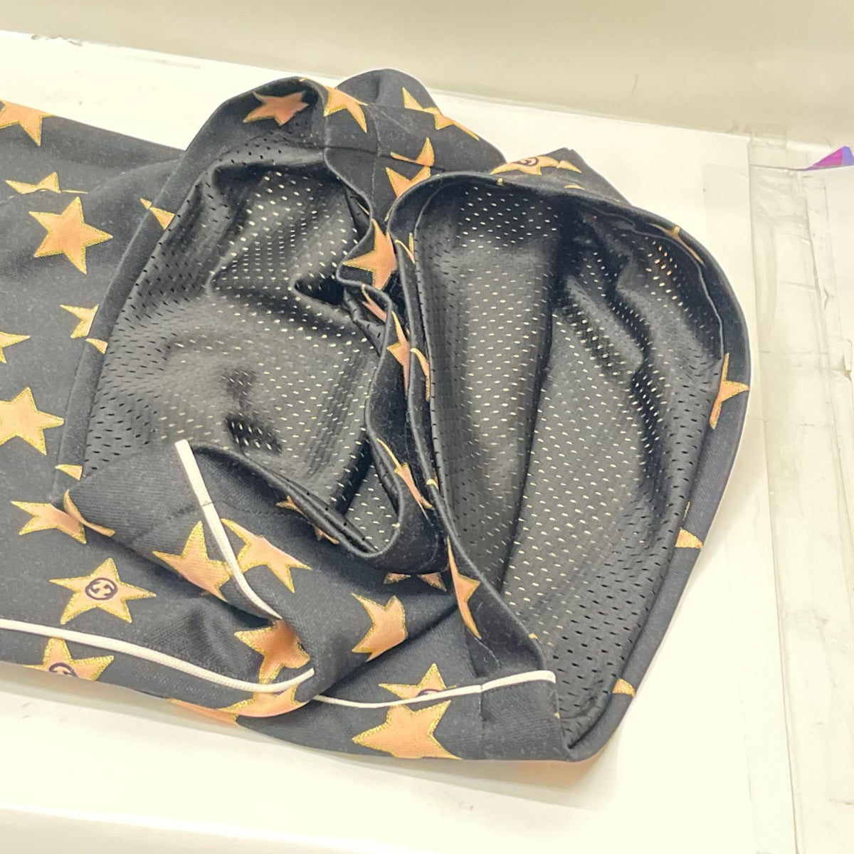 GUCCI/Technical jersey shorts with stars M 705299