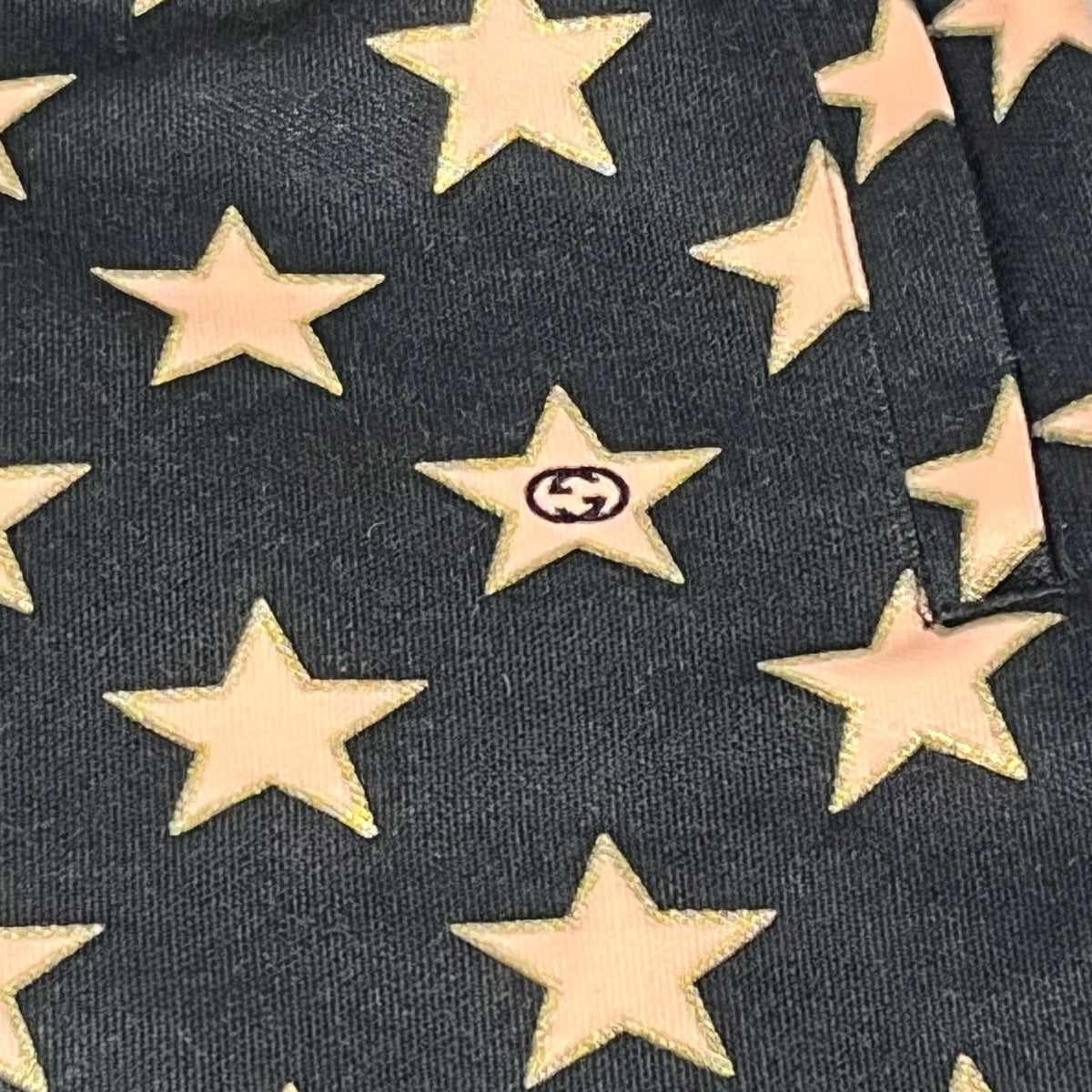 GUCCI/Technical jersey shorts with stars M 705299