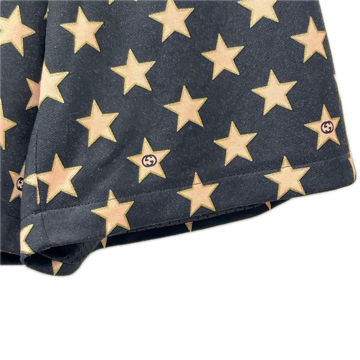 GUCCI/Technical jersey shorts with stars M 705299