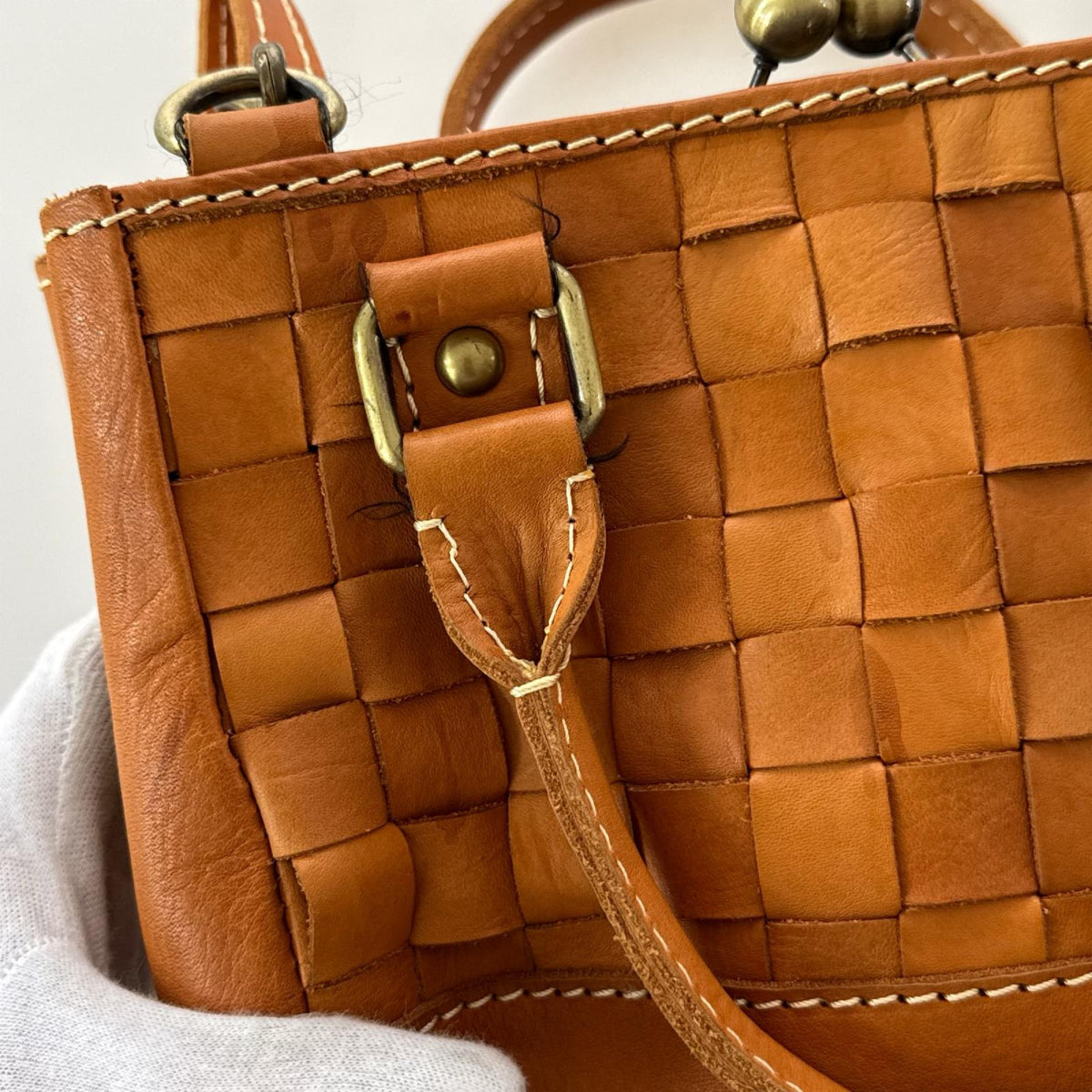 ショルダーバッグ zucchero FILATO がま口 レザーショルダーバッグ ブラウン