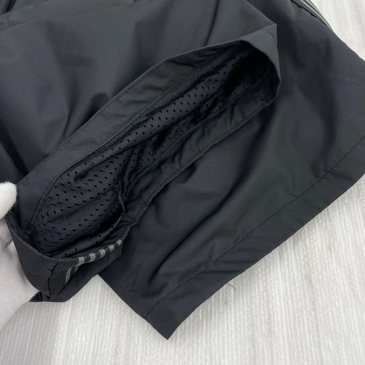 パンツ ヒザデルトラックパンツ ポリスムース BLK (XS) ブラック