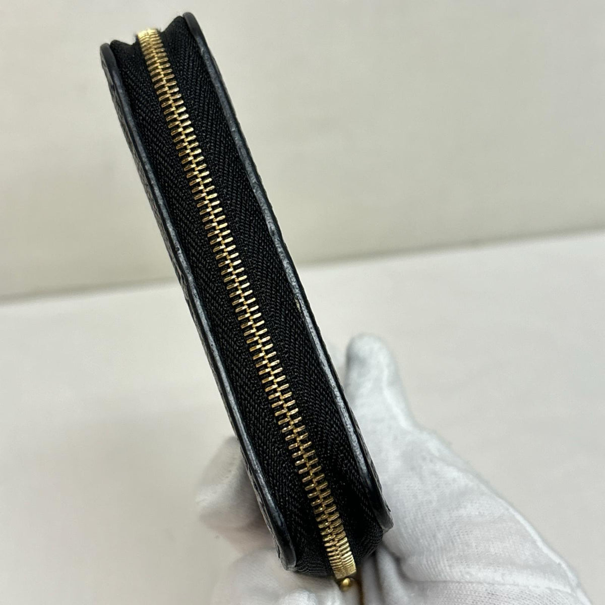ジッピーコインパース モノグラムアンプラント M60574